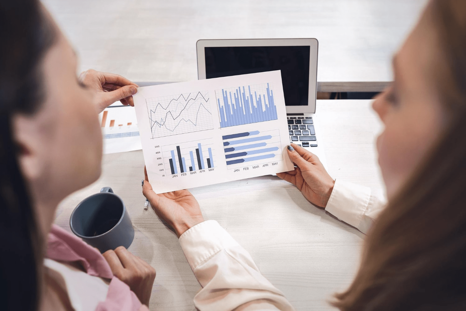 How to measure social media marketing performance: The Facts 6 Free photo two women entrepreneurs working together in office