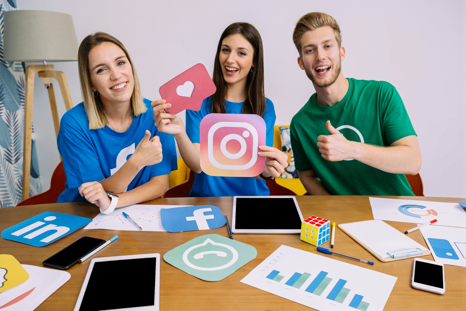 Understanding the Importance of Social Media Marketing 8 Free photo woman holding snapchat logo with his friends showing thumbup sign
