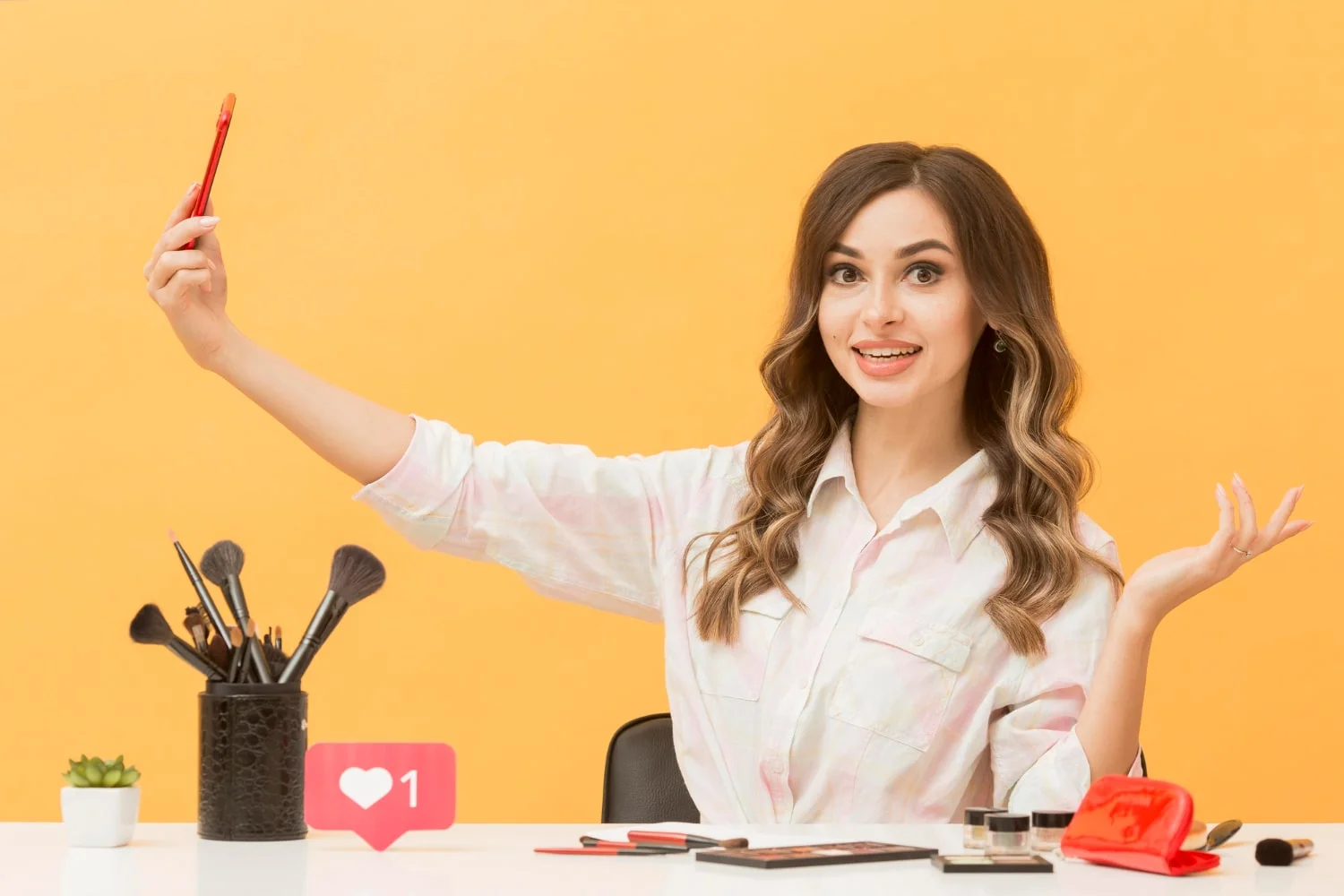 Image of a person holding a phone and smiling, representing successful influencer marketing stories.