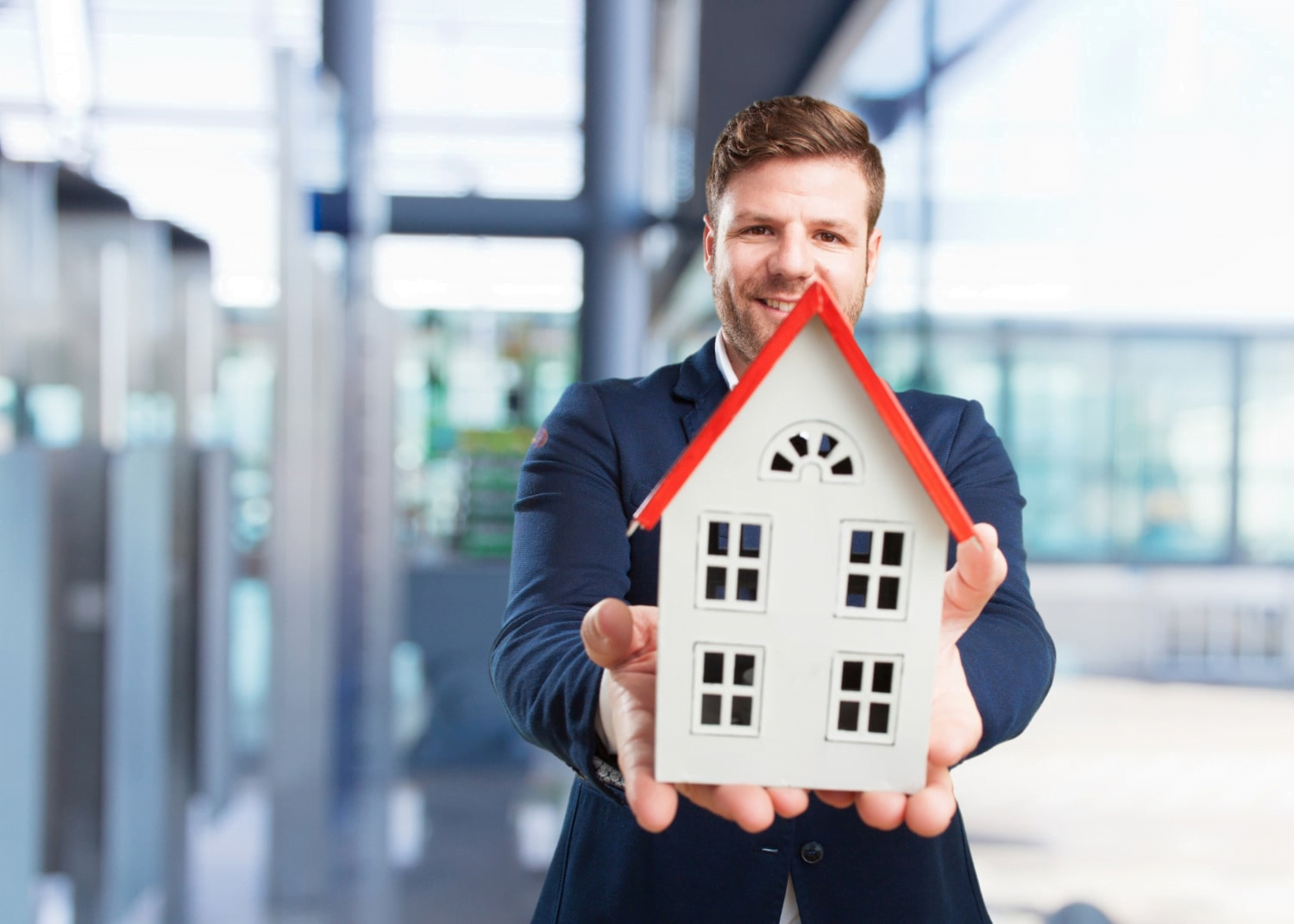 How to Market Real Estate on Social Media: A Comprehensive Guide 2 Young businessman happy expression