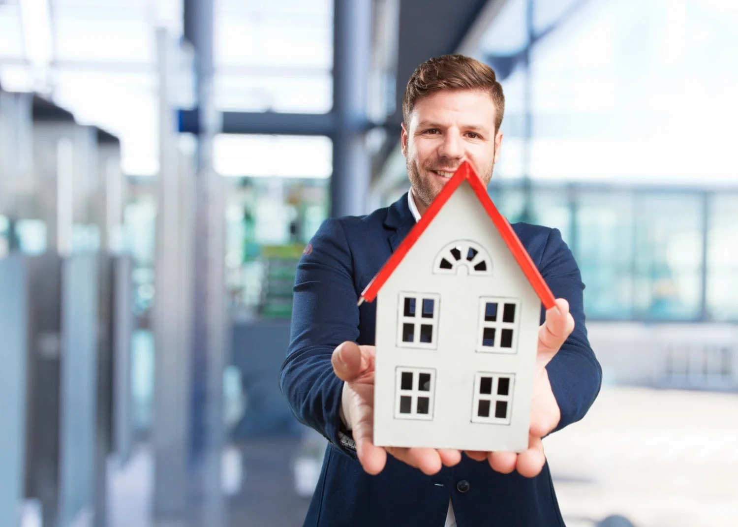 How to Market Real Estate on Social Media: A Comprehensive Guide 2 Young businessman happy expression