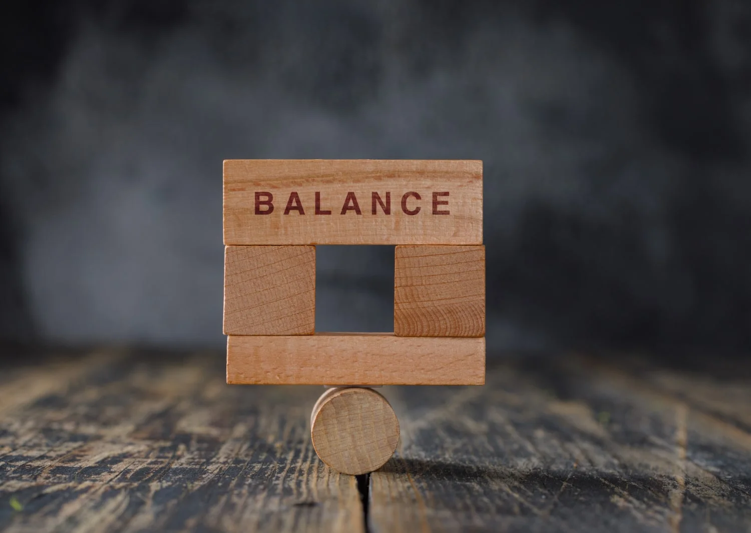 Free photo business and financial accounting concept with wooden blocks side view.